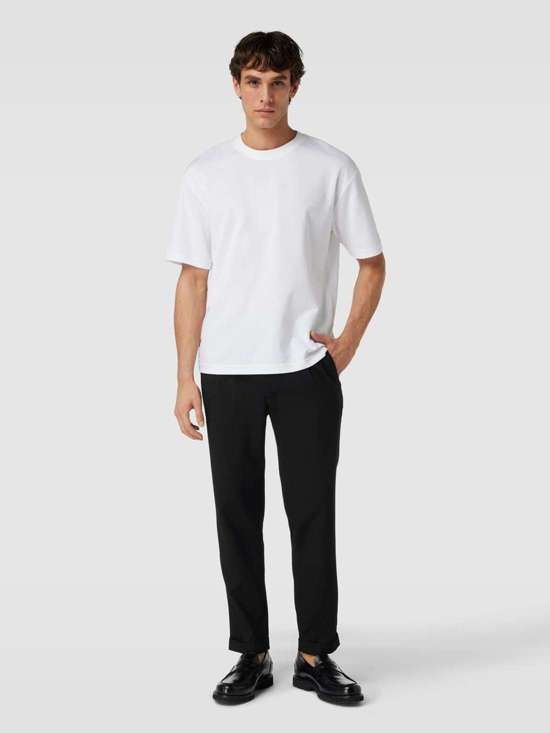 Брюки зауженного кроя из ткани со структурированным рисунком