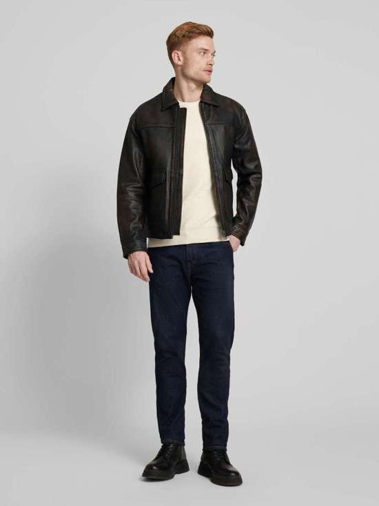 Вязаный свитер с нашивкой-лейблом