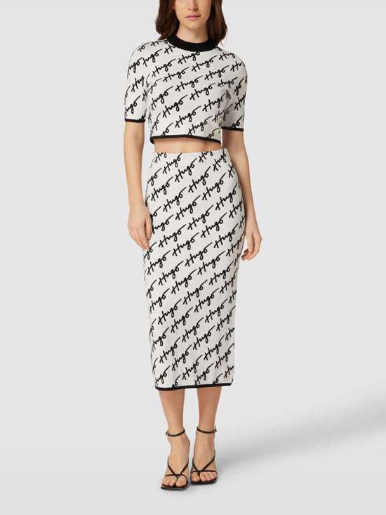 Юбка-миди с узором в виде этикеток по всей поверхности Sloquette