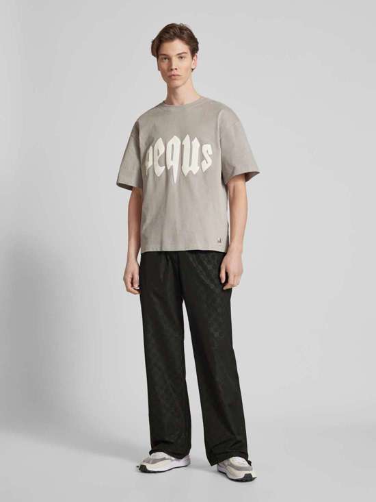 Спортивные штаны с этикеткой Aether