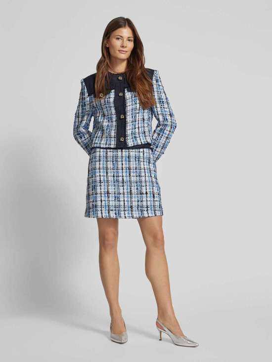 Мини-юбка в стиле букле Vosola