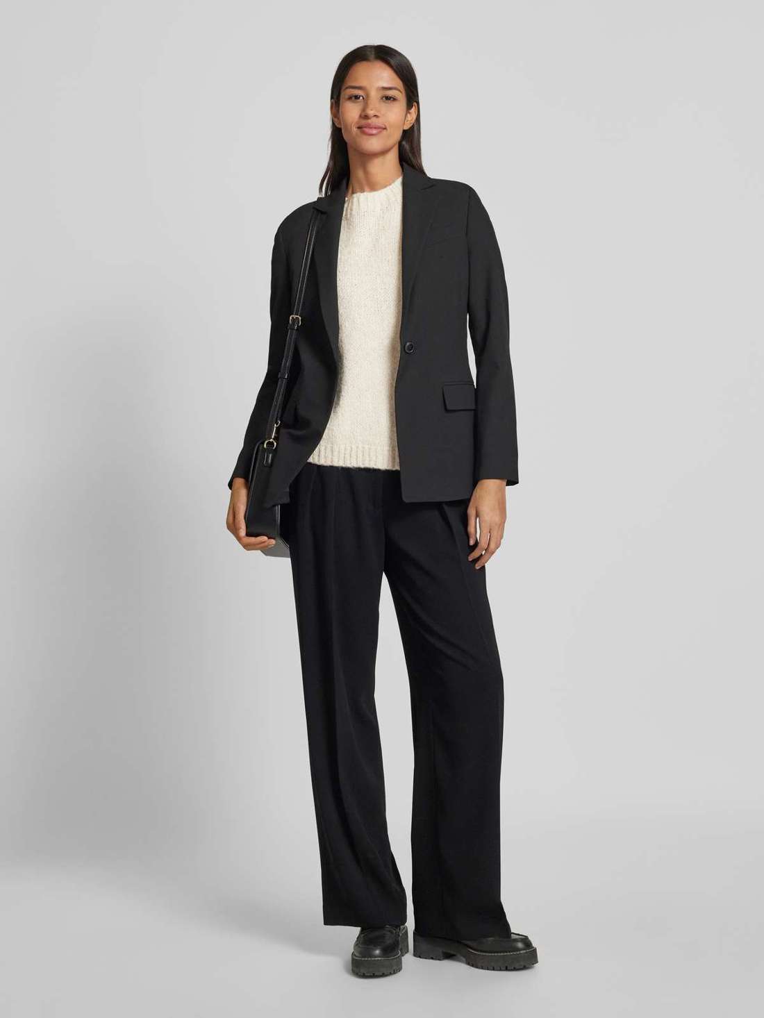 Вязаный свитер с ребристыми манжетами