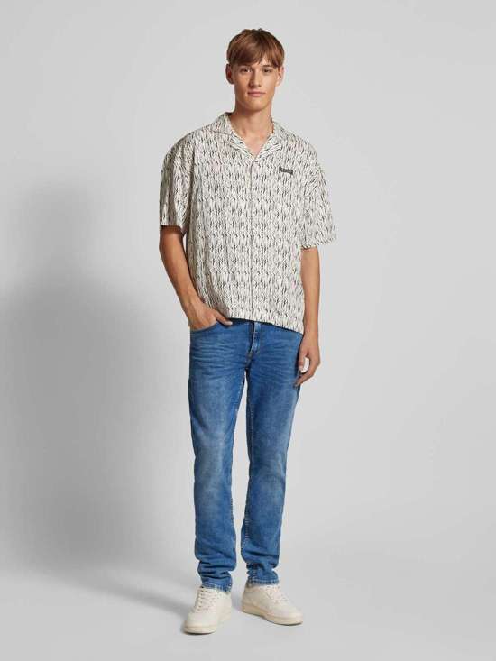 Джинсы Twister кроя с эффектом поношенности