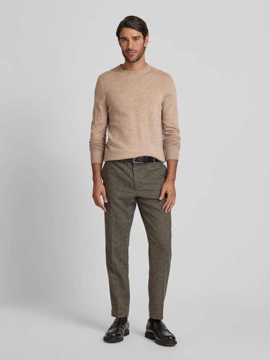 Вязаный свитер с ребристыми манжетами