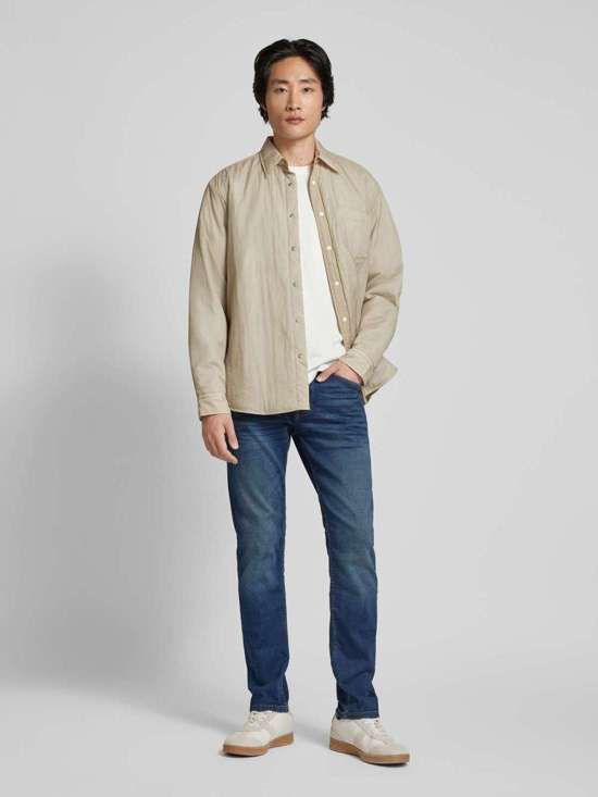 Джинсы приталенного кроя с эффектом поношенности SJÖBO