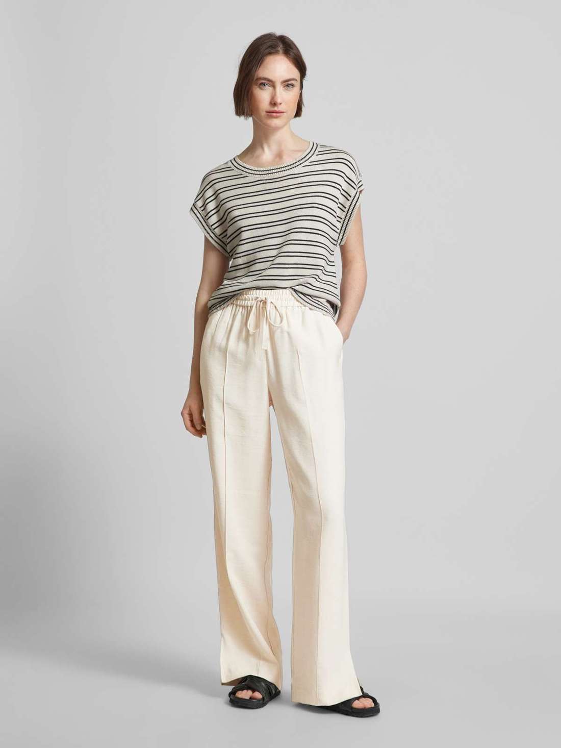 Брюки из ткани стандартного кроя с фиксированными складками Contri