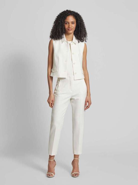 Тканевые брюки с карманами